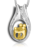 A gold and silver family pendant design featuring two adults and two children framed in an angel wing