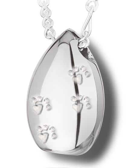A silver tear drop shaped pendant with tiny paw prints along the front.
