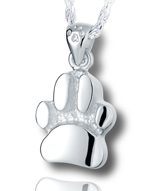 A silver, slightly curved paw print pendant with a textured background and a small paw print on the bail.
