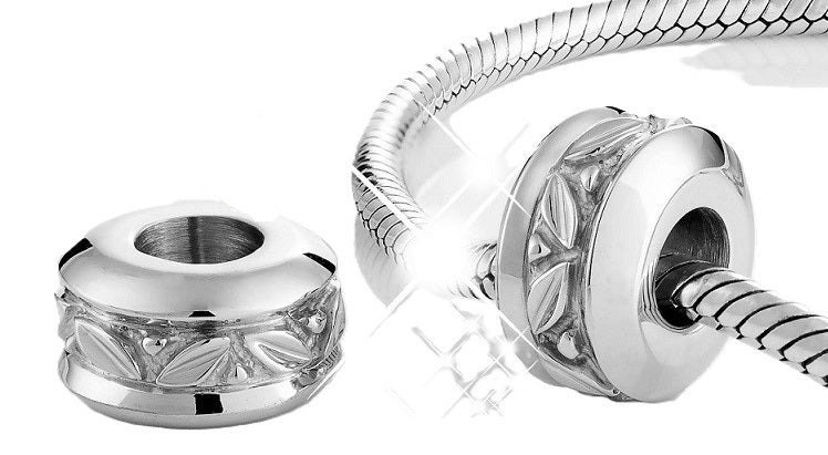 Silver bead  with leaves and berries motif  on a snake bracelet