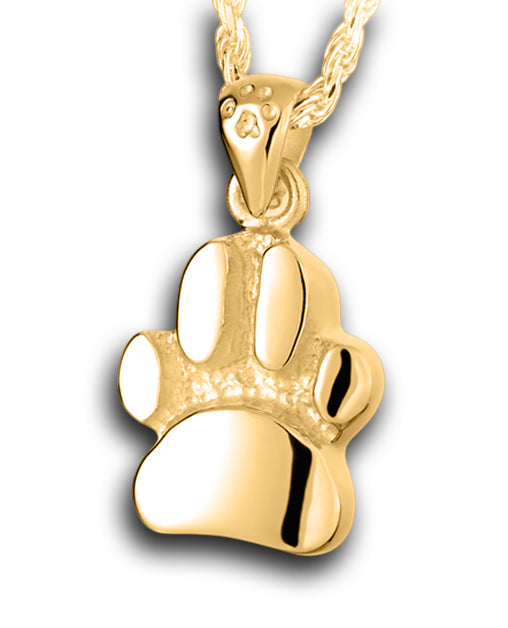 A Gold slightly curved paw print pendant with a textured background and a small paw print on the bail.
