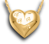 A Gold heart-shaped pendant necklace with paw prints engraved on it, displayed against a white background.